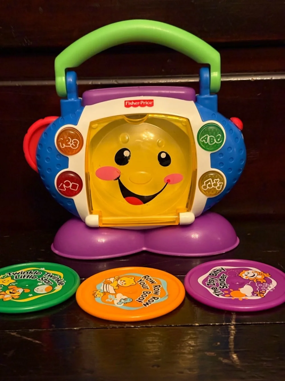 Fisher-Price Musical Activity Player Toy - Green Handle, Purple Base, Blue Sides